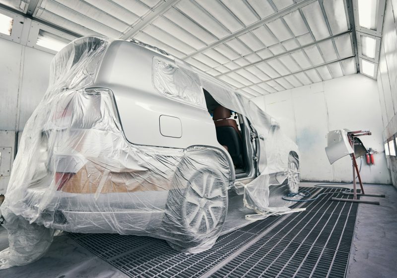 Car in a coating room ready for painting